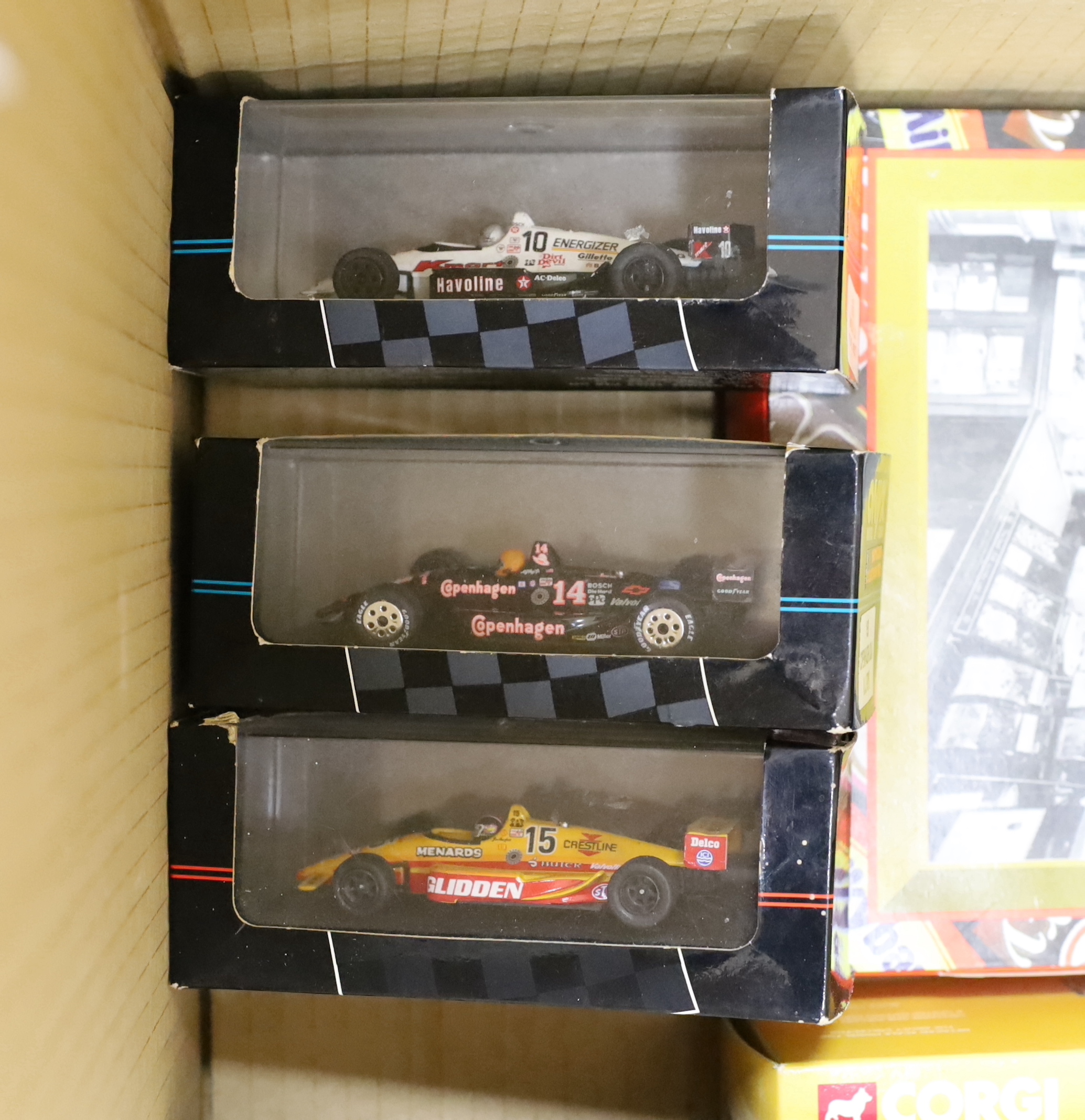 Four boxed Onyx Indie and F1 model racing cars, together with seven Corgi Classics commercial vehicles including; a Bedford VAL coach (35304), Scammell Highwayman Tanker (16305), Scammell Highwayman low loader (16901), e